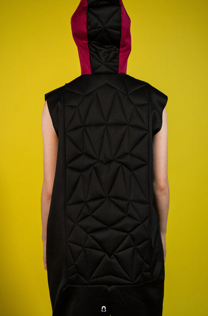 the asymmetric quilted gilet